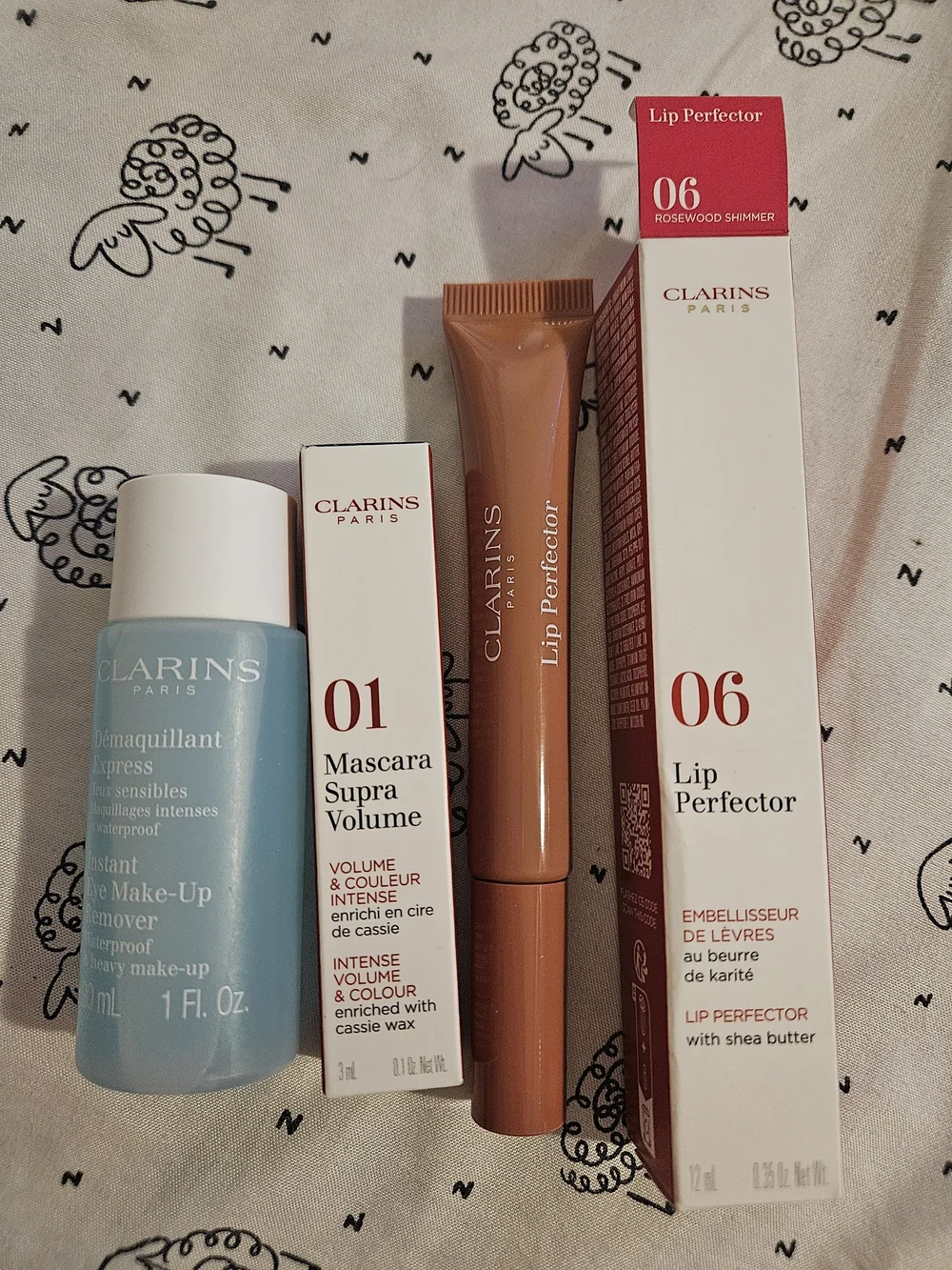 Clarins Lip Perfector 06 Rosewood Shimmer and Makeup Remover Mascara